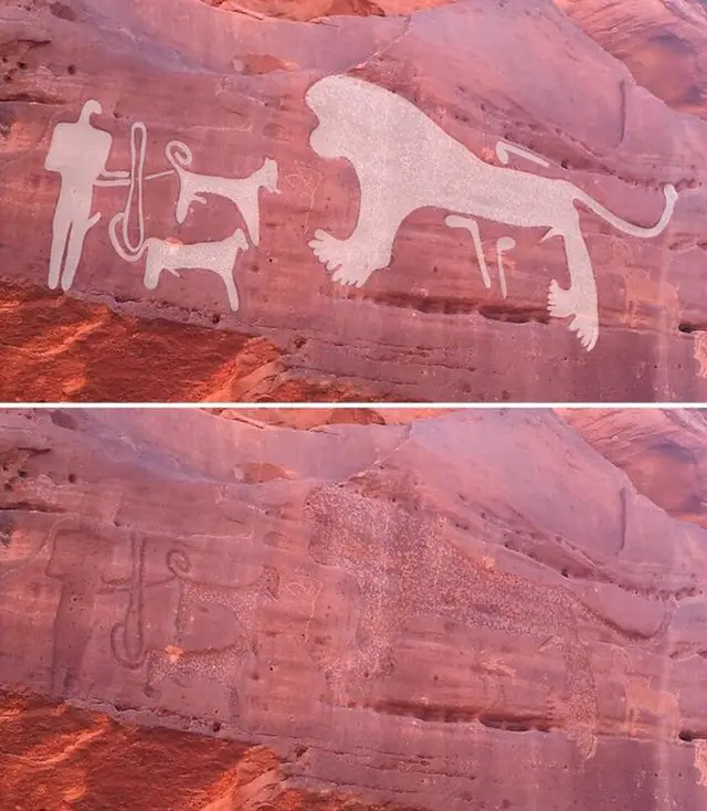 Rock art dogs on leashes