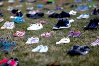 Shoes for shooting victims